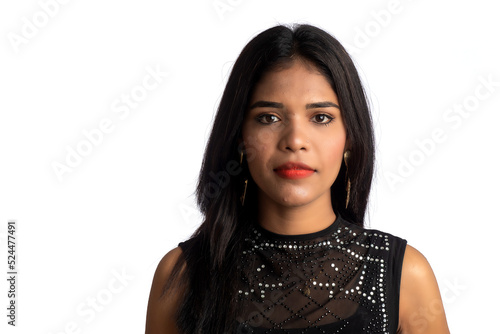 Portrait of a young girl wearing black dress posing on a white background