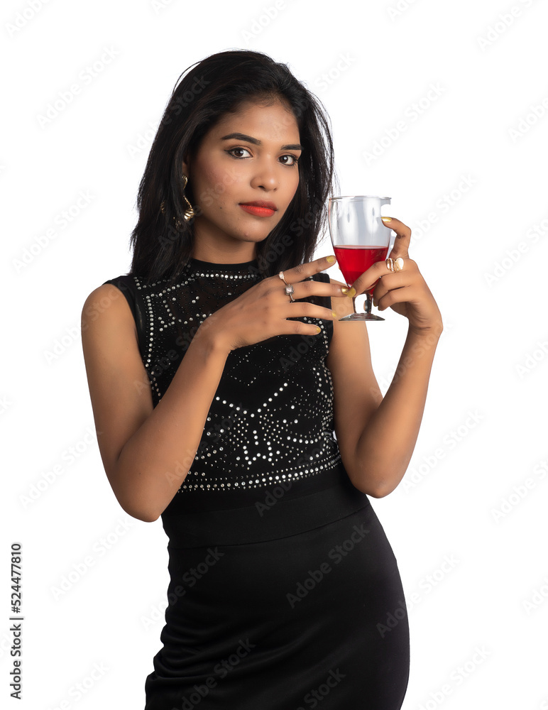 Portrait of a cheerful young woman holding a glass of wine isolated over white background Portrait of a cheerful young woman holding a glass of wine isolated over white background