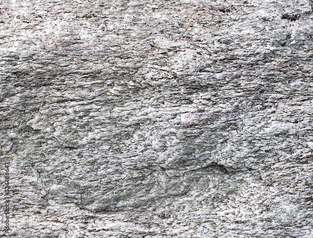 A natural gray stone as a background A natural gray stone as a background