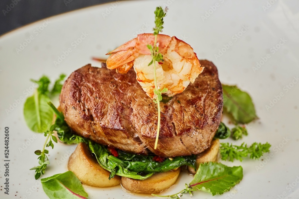 Pork, lamb or beef meatloaf with mushrooms, nuts, tomatoes and herbs. A dish from the chef for serving in a restaurant. Pork, lamb or beef meatloaf with mushrooms, nuts, tomatoes and herbs. A dish from the chef for serving in a restaurant.
