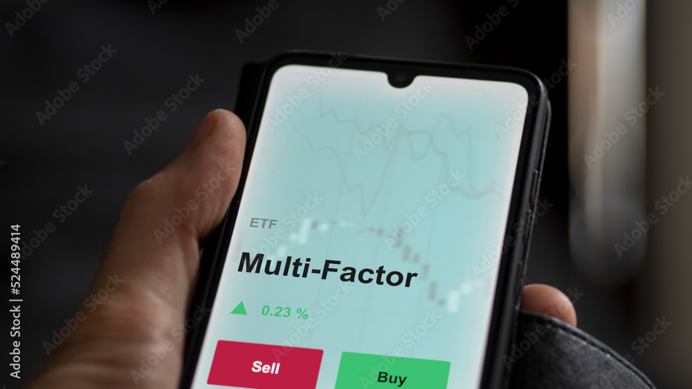 An investor's analyzing the multi factor etf fund on a screen. A phone shows the prices of multi-factor ETF.
An investor's analyzing the multi factor etf fund on a screen. A phone shows the prices of multi-factor ETF.