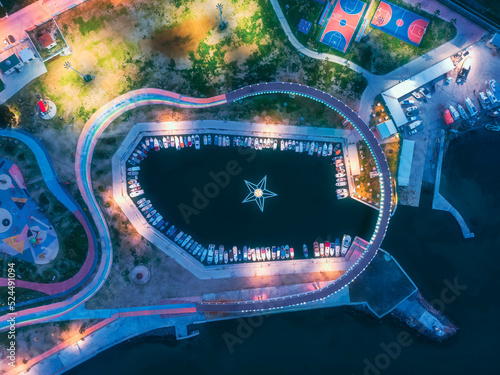 aerial view of aliaga avci ramadan park at sunset with beautiful clouds and colors photo