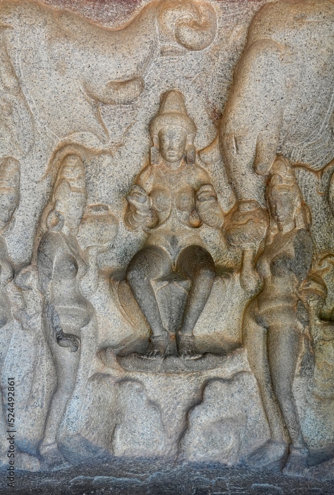 Indian rock art of bas relief sculptures of God, Animals carved in the monolithic rock cut cave temples in Mahabalipuram, Tamilnadu, India. Ancient historical relief sculptures in Tamilnadu.