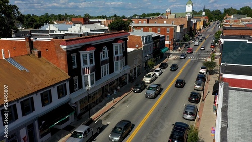 Low aerial view of main street usa, Charles Town, West Virginia, WV on a beautiful sunny day. photo