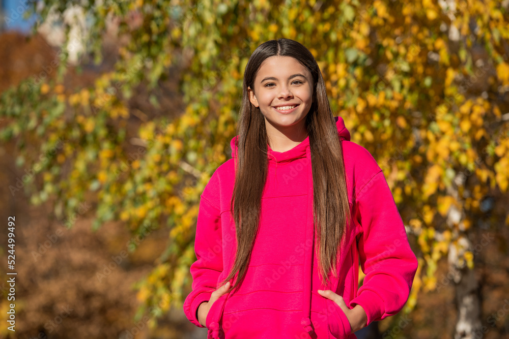 teen girl smile outdoor in autumn season teen girl smile outdoor in autumn season