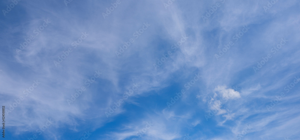 blue sky panorama background with tiny clouds