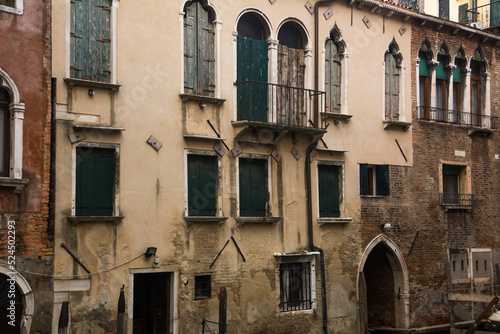 Facade of ancient buildings at the historical city of Venice, Veneto, Italy. © MANTOVAN