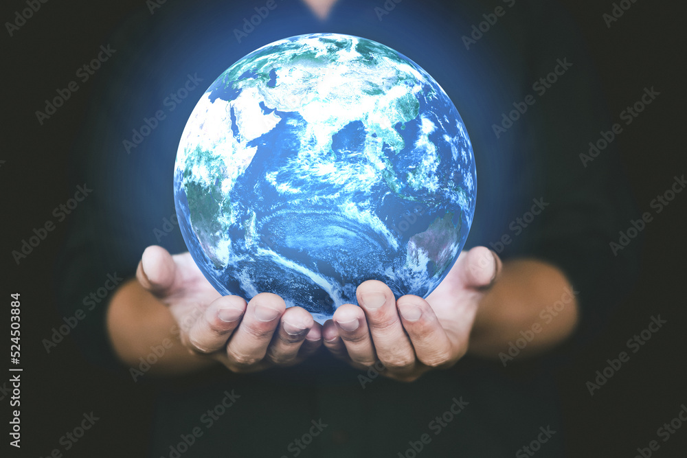 People hand holding Earth in concept of Earth day and Energy saving, Save Earth. People hand holding Earth in concept of Earth day and Energy saving, Save Earth.