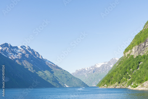 Spectacular views of the great Geiranger fjord surrounded by high mountains in Norway. © Jenni Ventura Martil