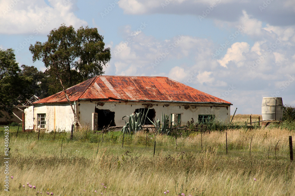 Photo of abandoned old houses and buildings in South Africa, red stone, mud and stone walls Photo of abandoned old houses and buildings in South Africa, red stone, mud and stone walls