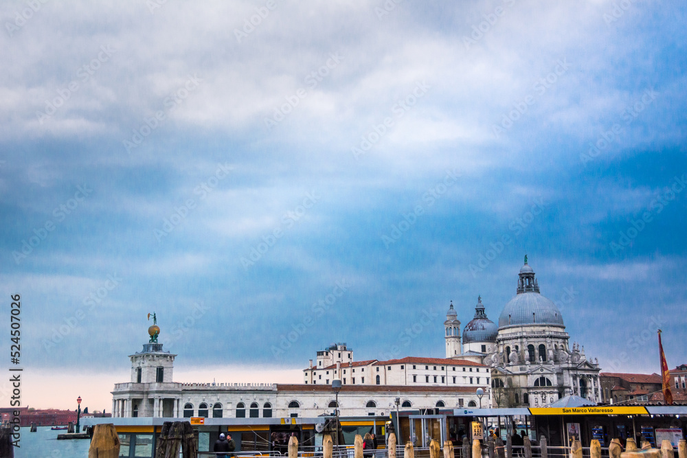 Fototapeta premium View of a port and a dome of ancient building at Venice, Veneto, Italy.