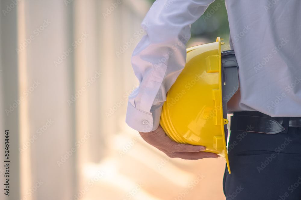 Engineer holding hard hat construction worker professional safety work industry building person manager service Engineer holding hard hat construction worker professional safety work industry building person manager service