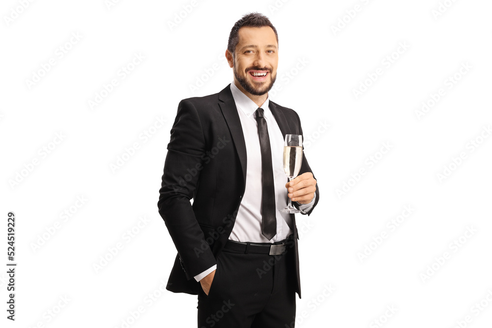 Businessman holding a glass of champagne and smiling Businessman holding a glass of champagne and smiling