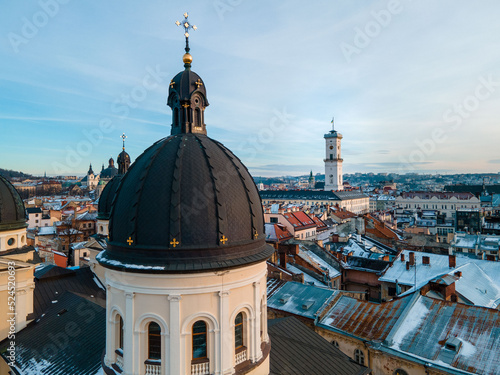aerial view of lviv city hall on sunset