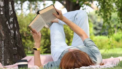 woman reading in a park
