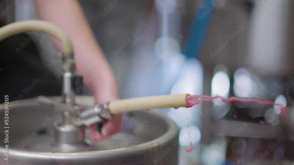 Brewer Fills Keg and Beer Squirts Out Brewer Fills Keg and Beer Squirts Out