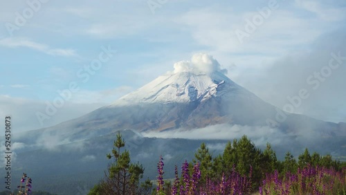 View of the Popocatepetl volcano in Puebla, Mexico photo