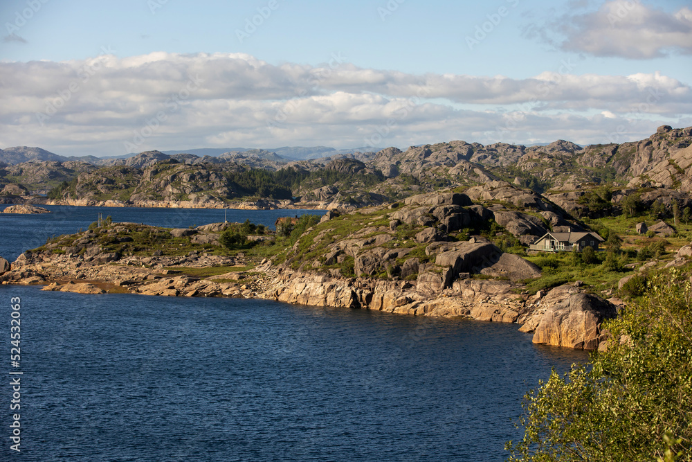Fototapeta premium Happy people, enjoying amazing views in South Norway coastline, fjords, lakes, beautiful nature