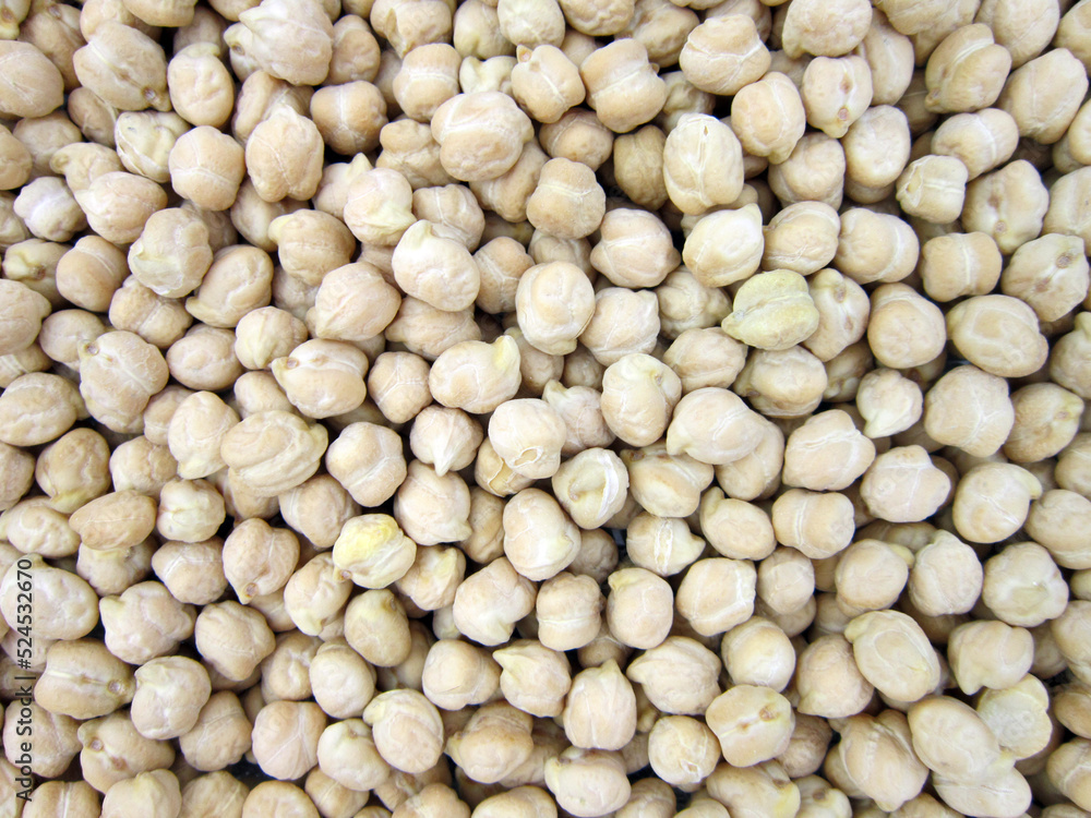 dried chickpea as background. Closeup uncooked chickpea top view Vegan healthy nutrition dried chickpea as background. Closeup uncooked chickpea top view Vegan healthy nutrition