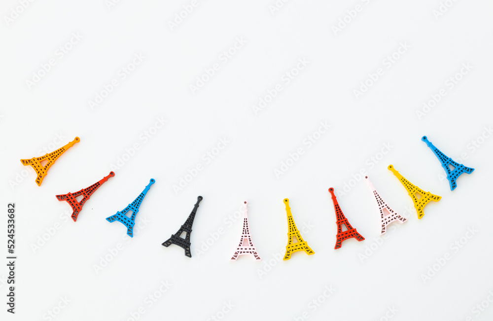 Colored wooden Eiffel Tower on white background