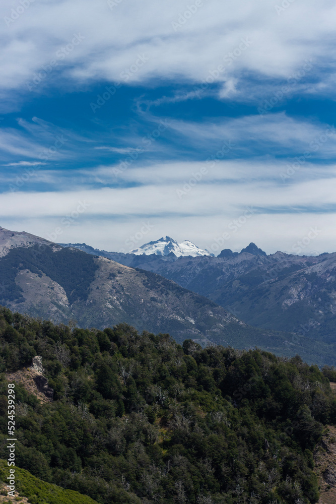 Amazing panoramic of a mountain and clouds in San Carlos de Bariloche, Argentina, Patagonia, South America. Vertical