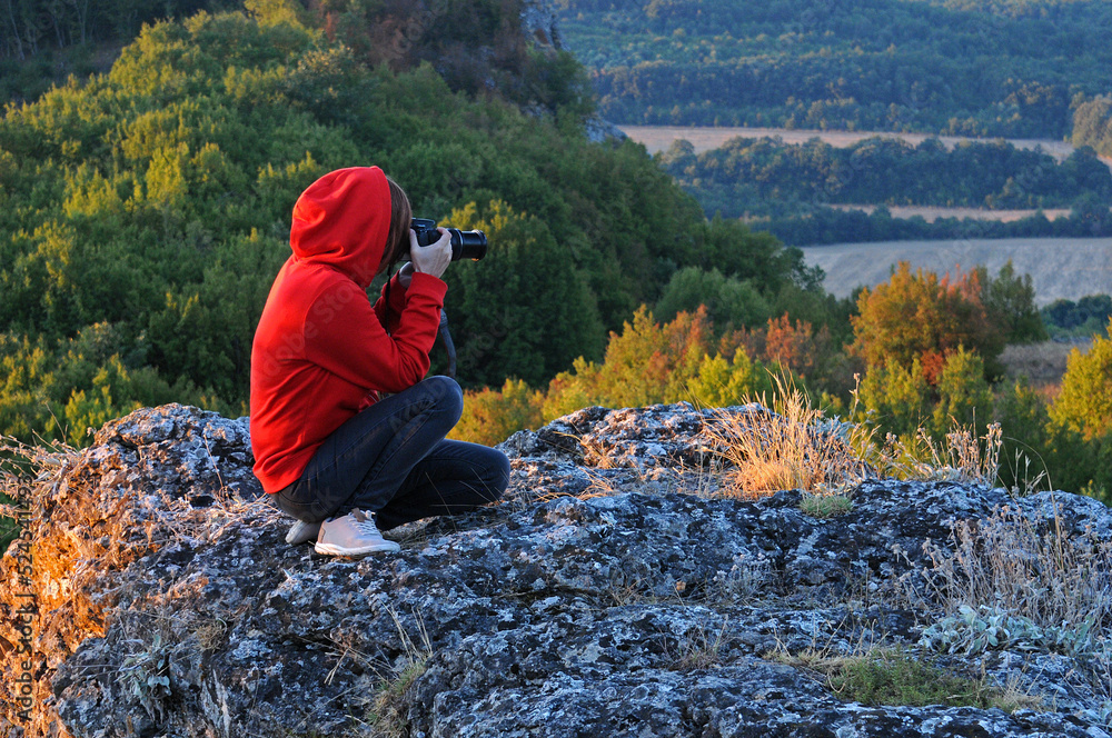 Lady in red hoodie take photos Lady in red hoodie take photos