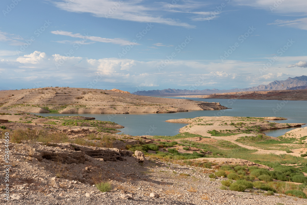 Viewpoint from interior rocky shore Lake Mead which should be fully underwater now receding severe drought climate change August 2022