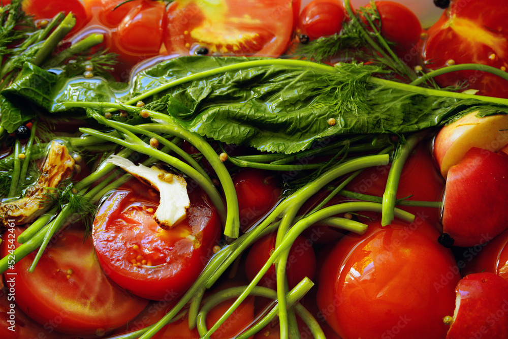 Salted tomatoes with horseradish leaves and spices.Homemade food Salted tomatoes with horseradish leaves and spices.Homemade food