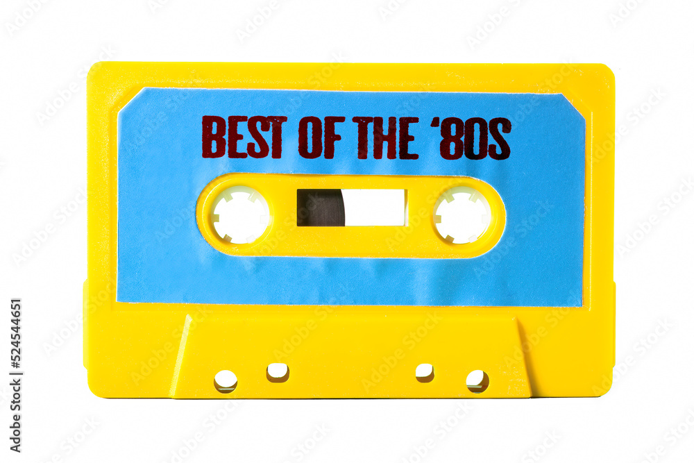 Naklejka premium An old vintage cassette tape for easy storage of music and audio, isolated, with text on the label: best of the 80s. 