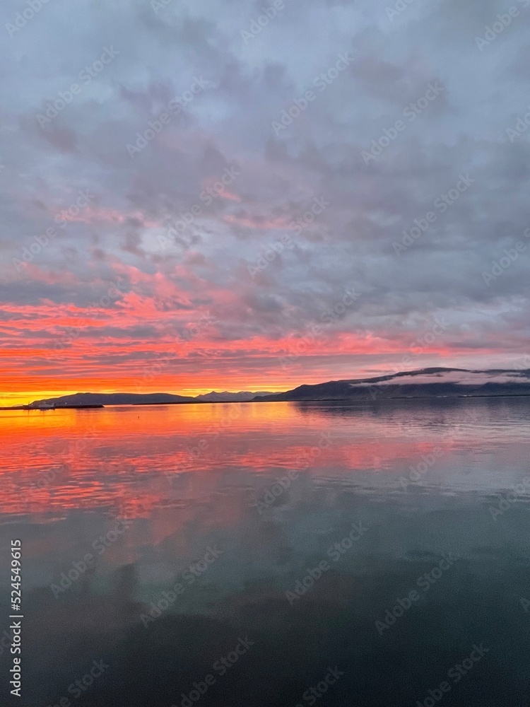 sunset over the river and mountains in iceland sunset over the river and mountains in iceland
