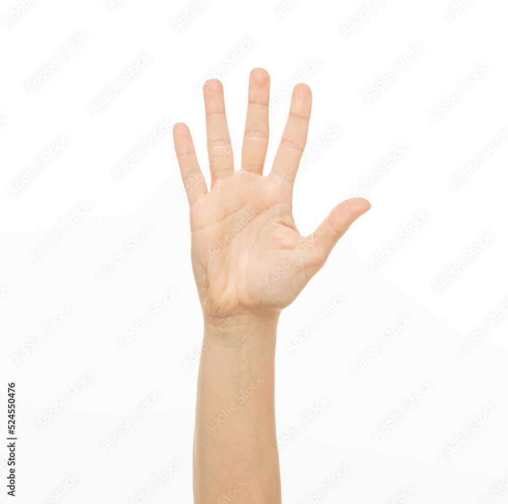 female hand shows gestures on a white background isolated.number direction fist approval female hand shows gestures on a white background isolated.number direction fist approval