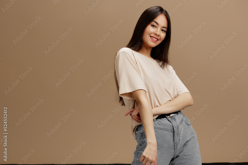 Obraz premium woman in a beige T-shirt posing clothing fashion studio model