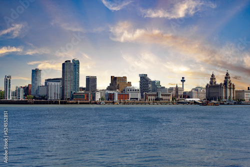 A beautiful landscape shot of the Liverpool City skyline. present are the Liver Birds, City Tower, Ferry Terminal and other famous buildings.