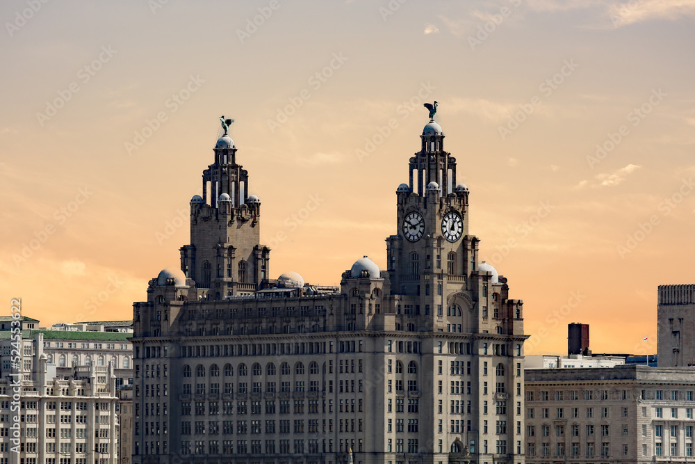 A beautiful photograph of the famous Liver Birds in Liverpool. This image has been taken from the promenade at New Brighton across the River Mersey.