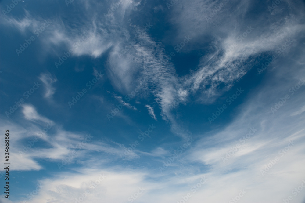 blue background. blue sky and white clouds in the photo blue background. blue sky and white clouds in the photo