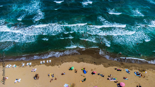 Fototapeta Naklejka Na Ścianę i Meble -  Aerial view to tropical sandy beach and blue ocean stock photo