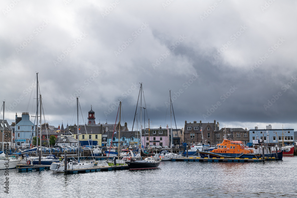 18 August 2022. Stornoway, Isle of Lewis, Highlands and Islands, Scotland. This is a scene of Stornoway Harbour on an August morning as rain clouds started to break up.