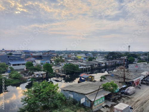 Aerial view of a slum settlement on the north side of Jakarta. This settlement is located on the edge of the river.