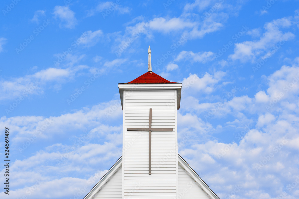 Christian church steeple and blue sky with copy space Christian church steeple and blue sky with copy space