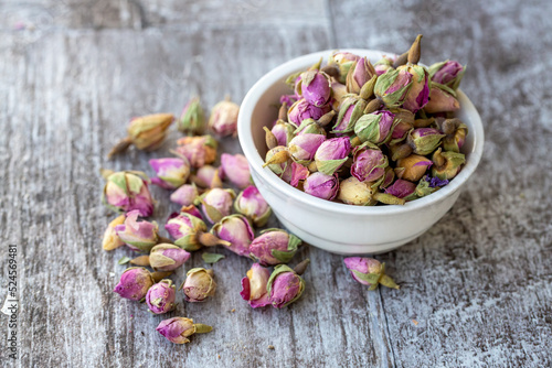 Dried small pink rose on th...