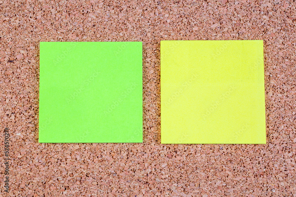 Collection of various note papers on corkboard Collection of various note papers on corkboard