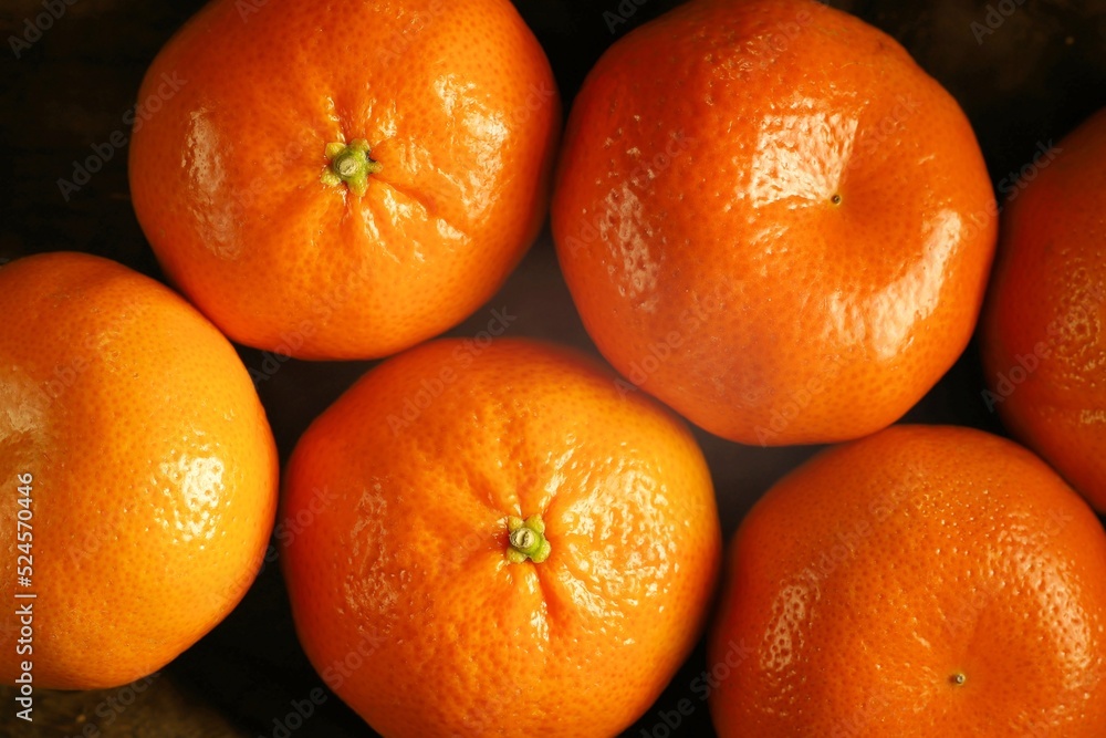 Isolated close-up of Mandarin oranges (Citrus reticulata) Isolated close-up of Mandarin oranges (Citrus reticulata)
