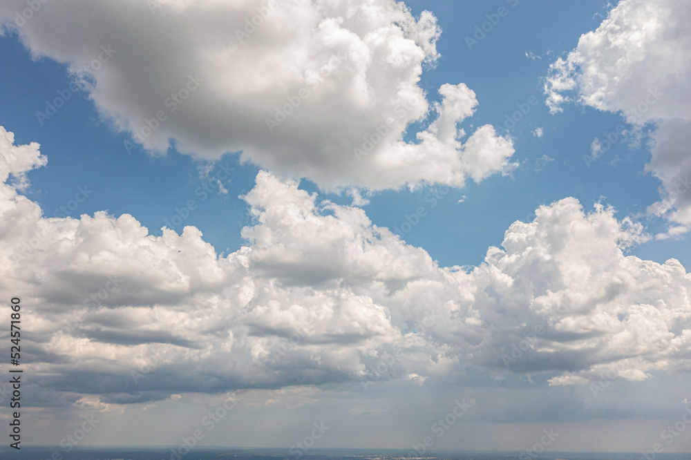 Blue Sky with White Clouds up in the sky Blue Sky with White Clouds up in the sky