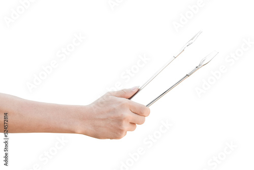 Hand holding kitchen tongs isolated on transparent background - PNG format. photo