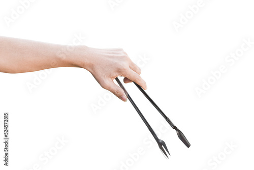 Tableau sur toile Hand holding kitchen tongs isolated on transparent background - PNG format