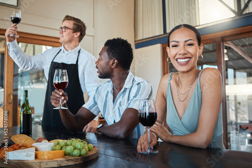 Couple and chef with glass of red wine alcohol and happy drinking portrait at a luxury restaurant. Sommelier with best, fine or quality wine tasting drink for food, culinary or hospitality industry