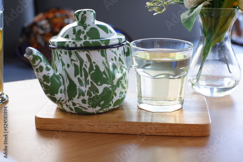 a glass of tea on the table