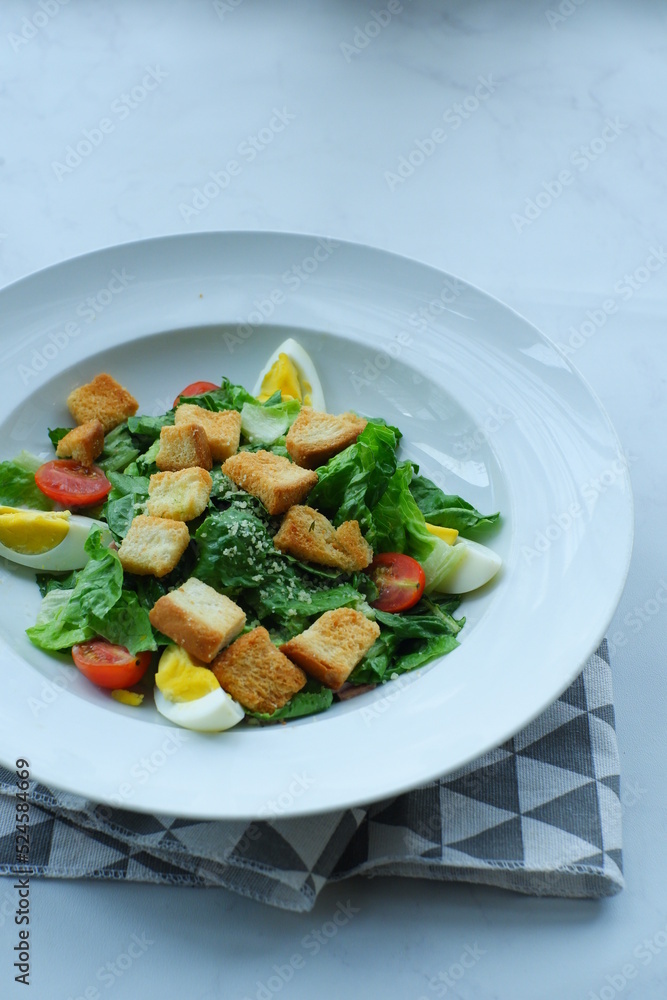 a plate of salad in white background a plate of salad in white background