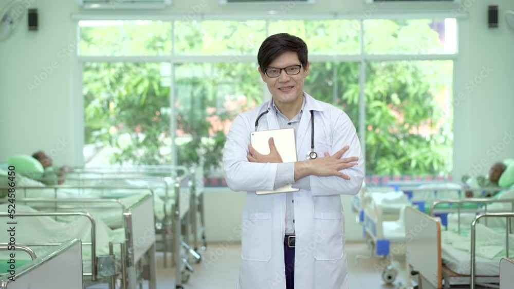 Asian doctor working in the hospital ward. Asian doctor working in the hospital ward.