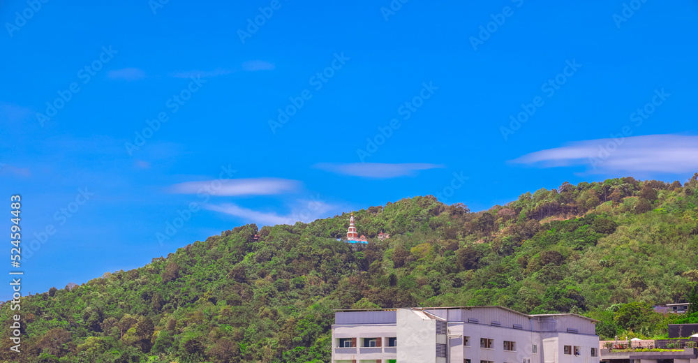 Phangna Bay near the Island of Phuket Thailand. Lovely rock in the middle of the ocean surrounded by mountains